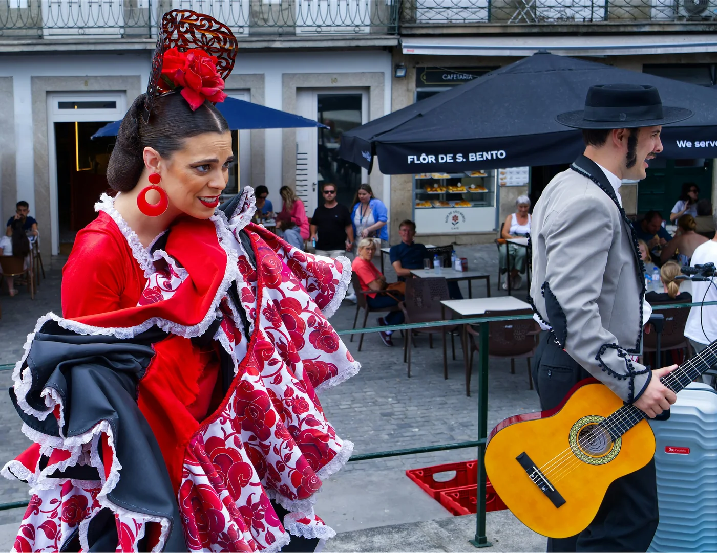 A flamenco dancer in a ruffled dress mid-movement